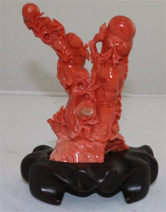 A Chinese red coral group of Shou Lao, an attendant and a deer, 20th century,